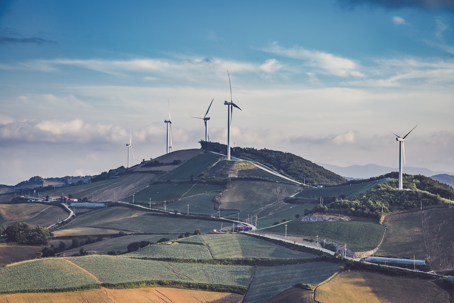 A landscape with wind farms.